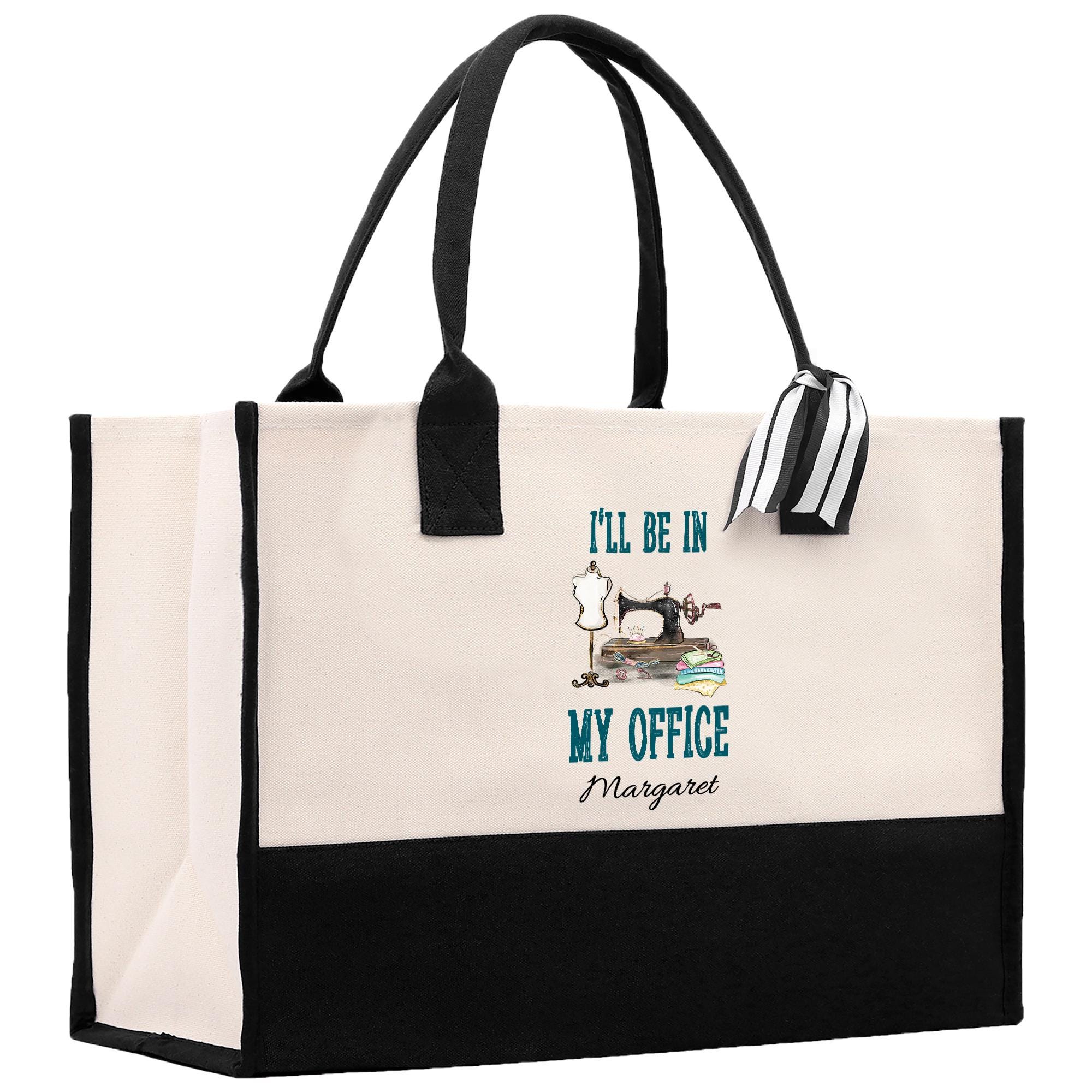 a black and white bag with a dog on it