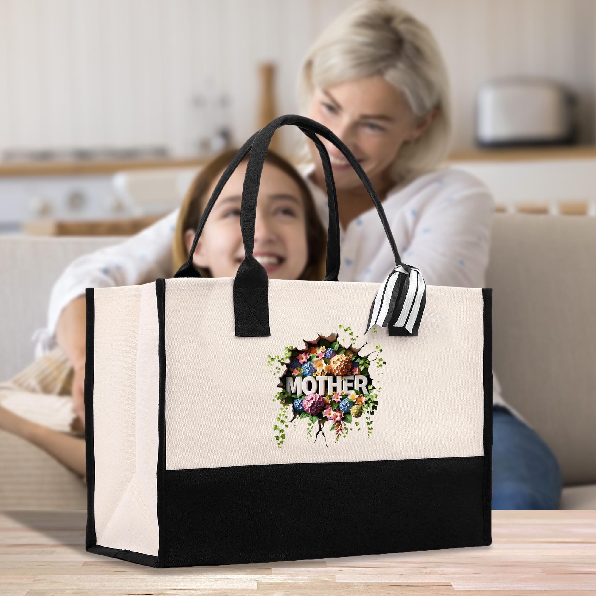 a woman sitting on a couch next to a woman holding a black and white bag
