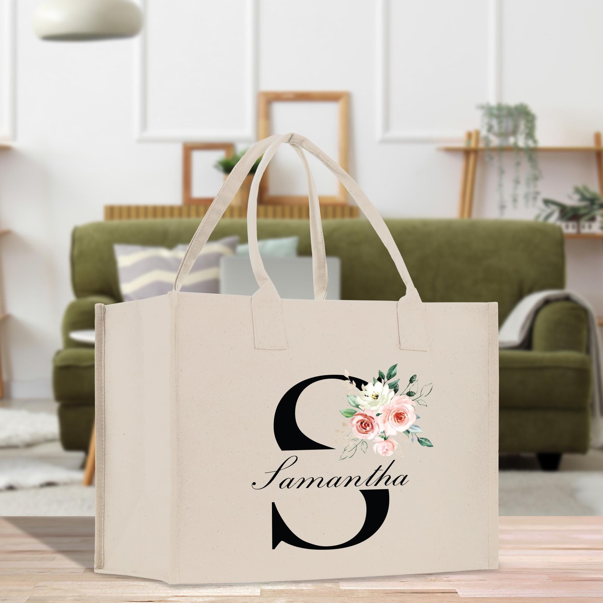 a bag with a flower on it sitting on a table
