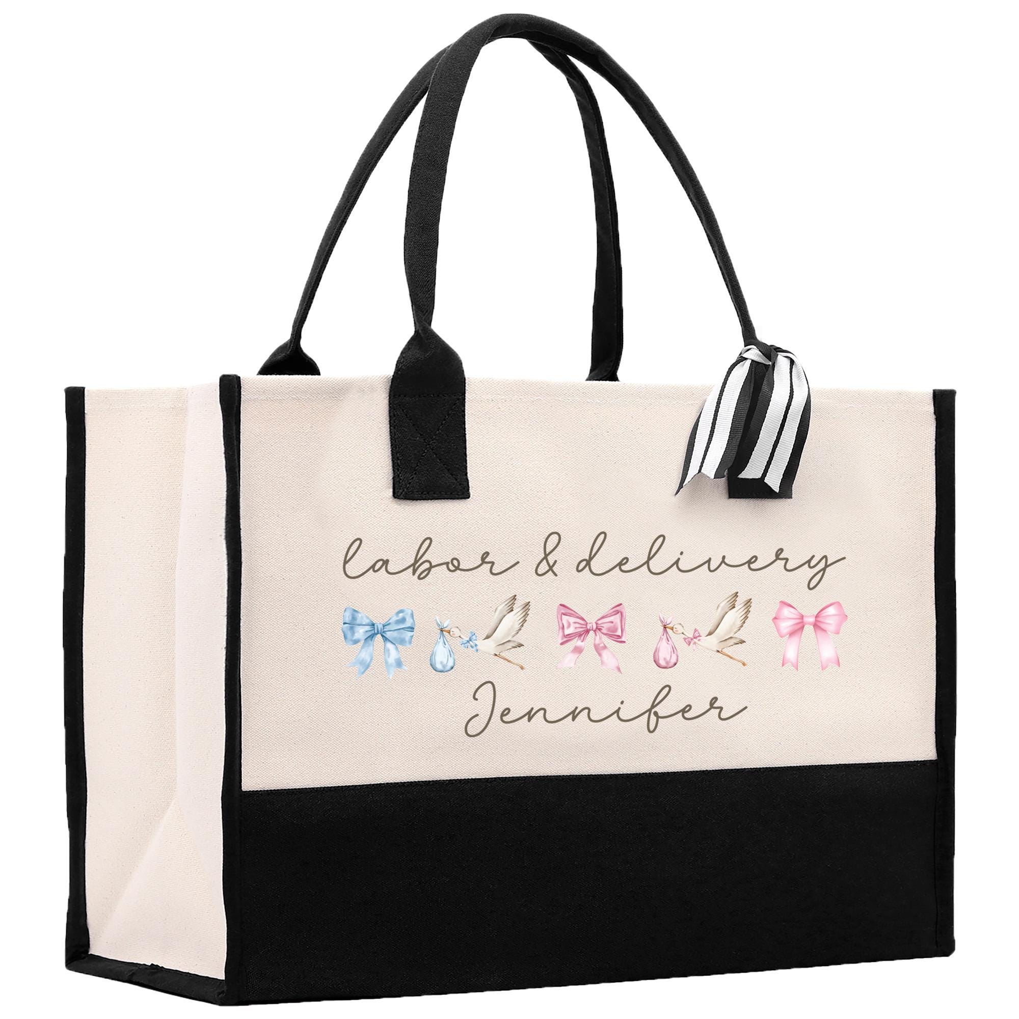 a black and white bag with a bow on it