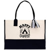 A black and white tote bag with the text 