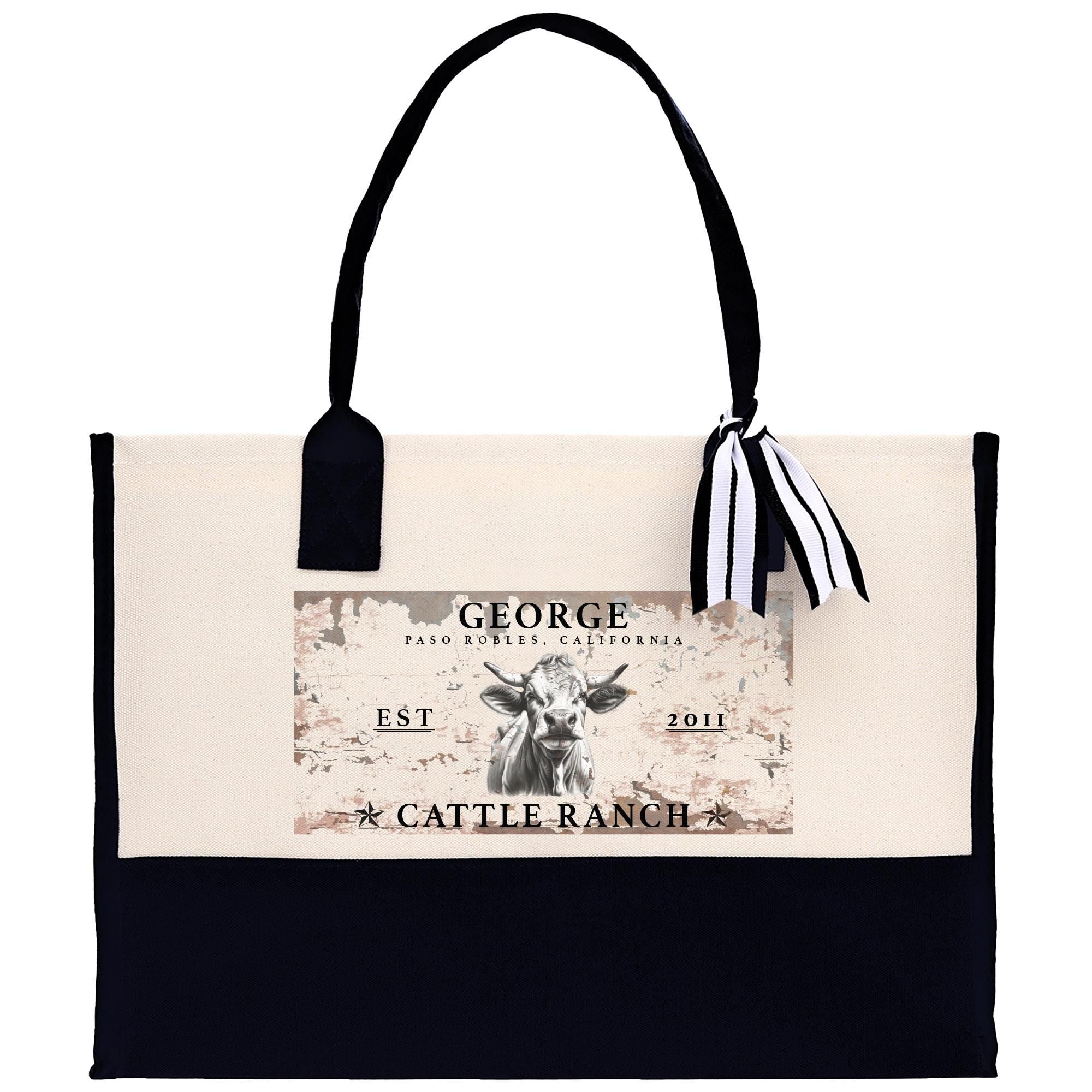a tote bag with a printed design on it, including a cow and the text &quot;GEORGE PASO ROBE ROBIN&quot; and &quot;CATTLE RANCH&quot; printed on it.