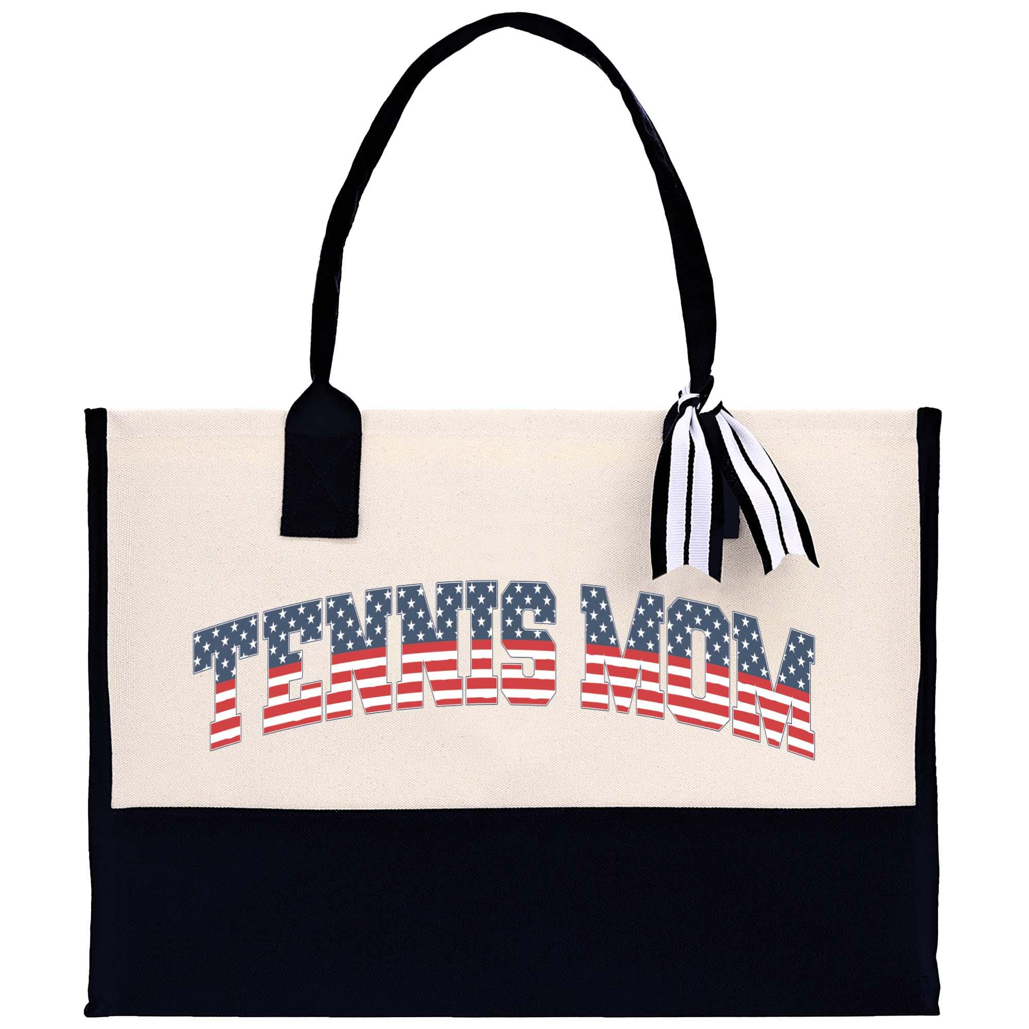 a white and black tote bag with an american flag on it