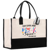 a black and white tote bag with a name on it