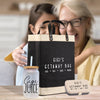 a woman and a child are looking at a bag
