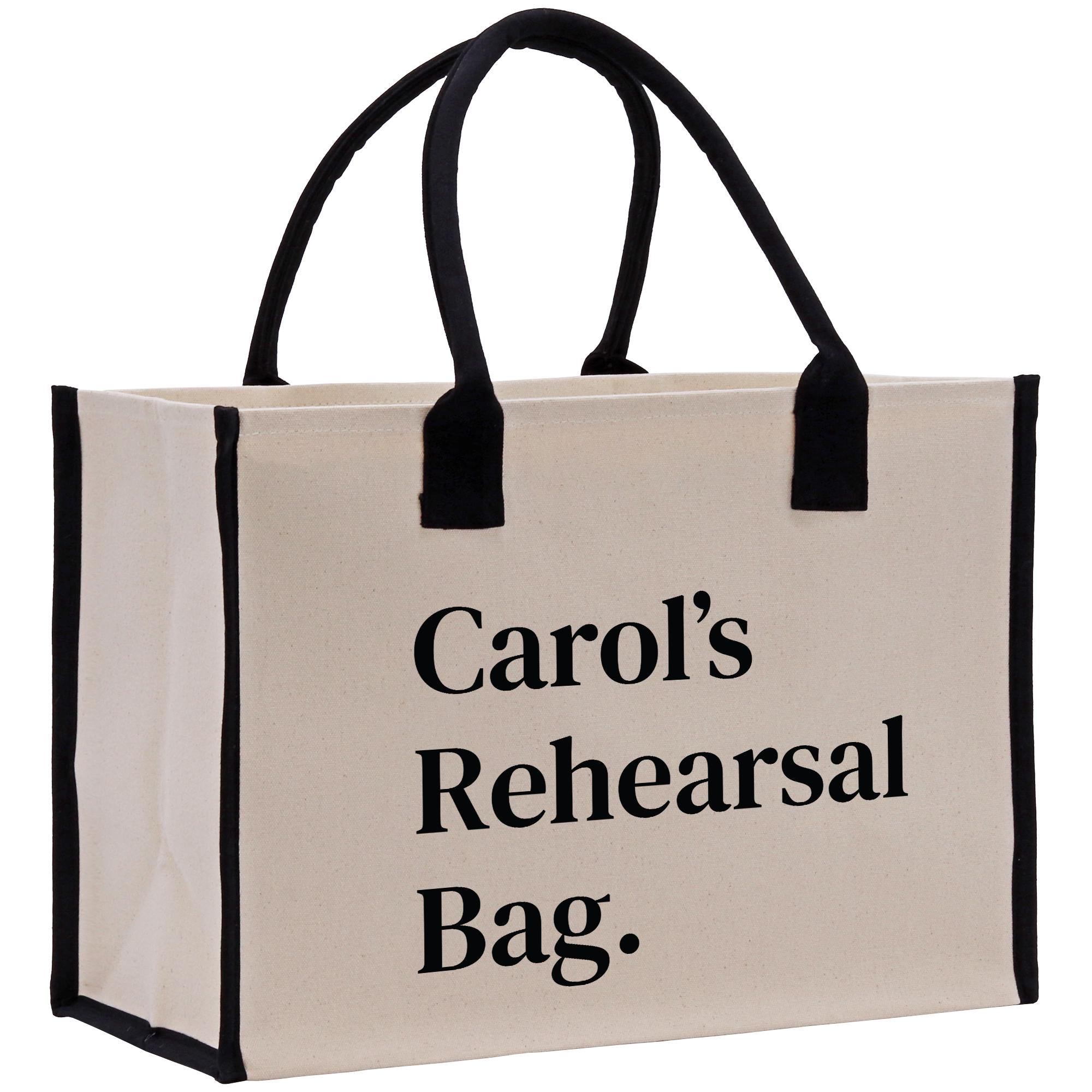 a black and white bag with the words carol&#39;s rehearal bag on
