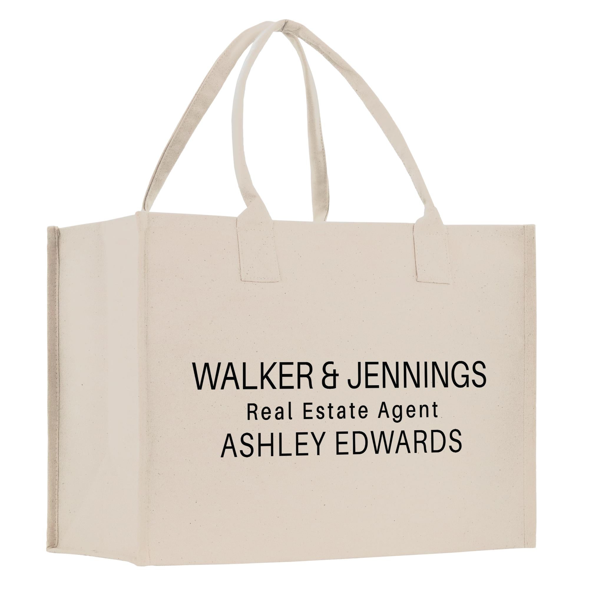 A beige canvas tote bag with the text &quot;WALKER & JENNINGS Real Estate Agent ASHLY EDWARDS&quot; printed on it.