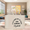 a white bag that says it's a good day to teach tiny humans el