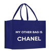 a blue shopping bag that says, my other bag is chanel
