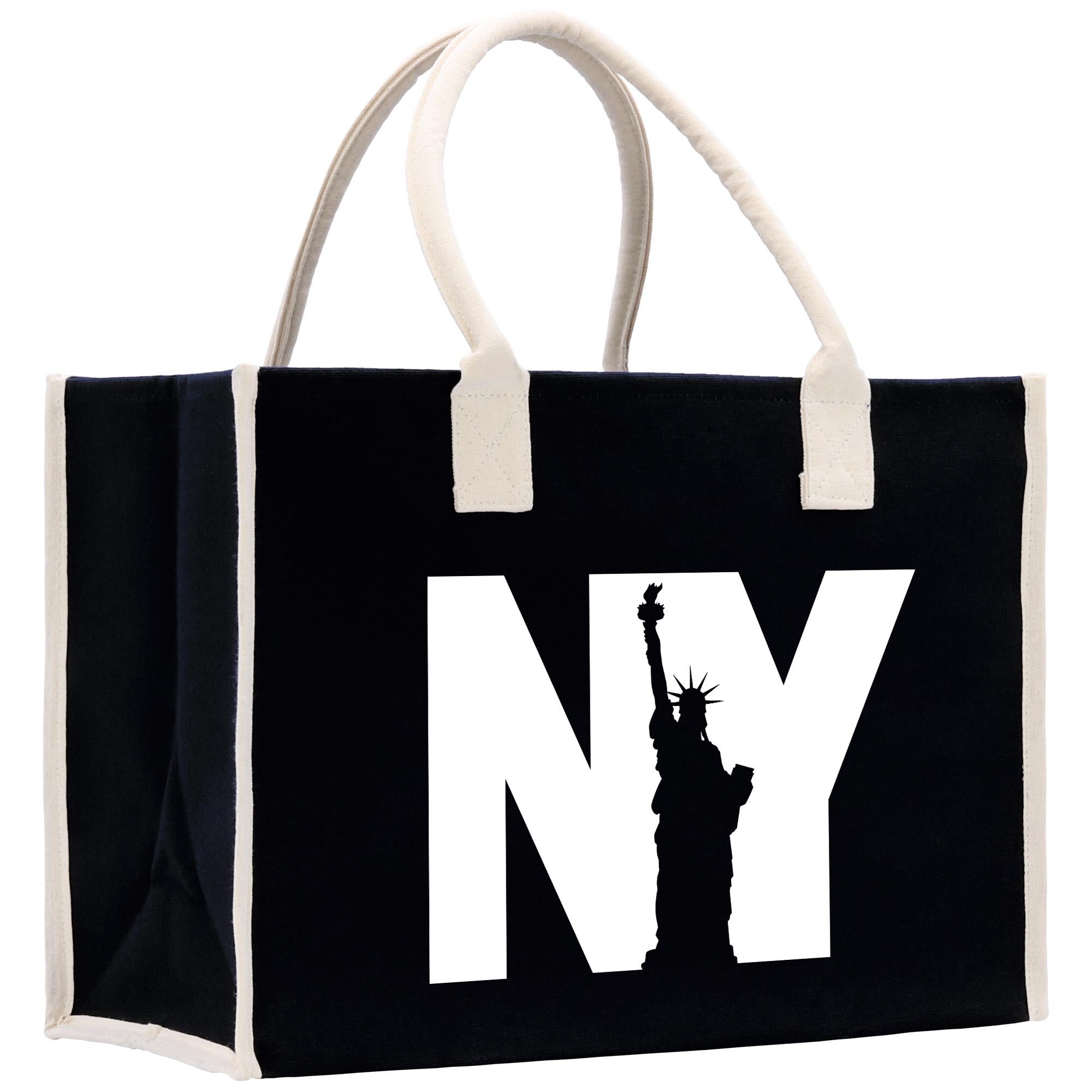 a black and white bag with the statue of liberty on it