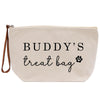 A beige canvas bag with the text "BUDDY'S TREAT BAG" printed on it.