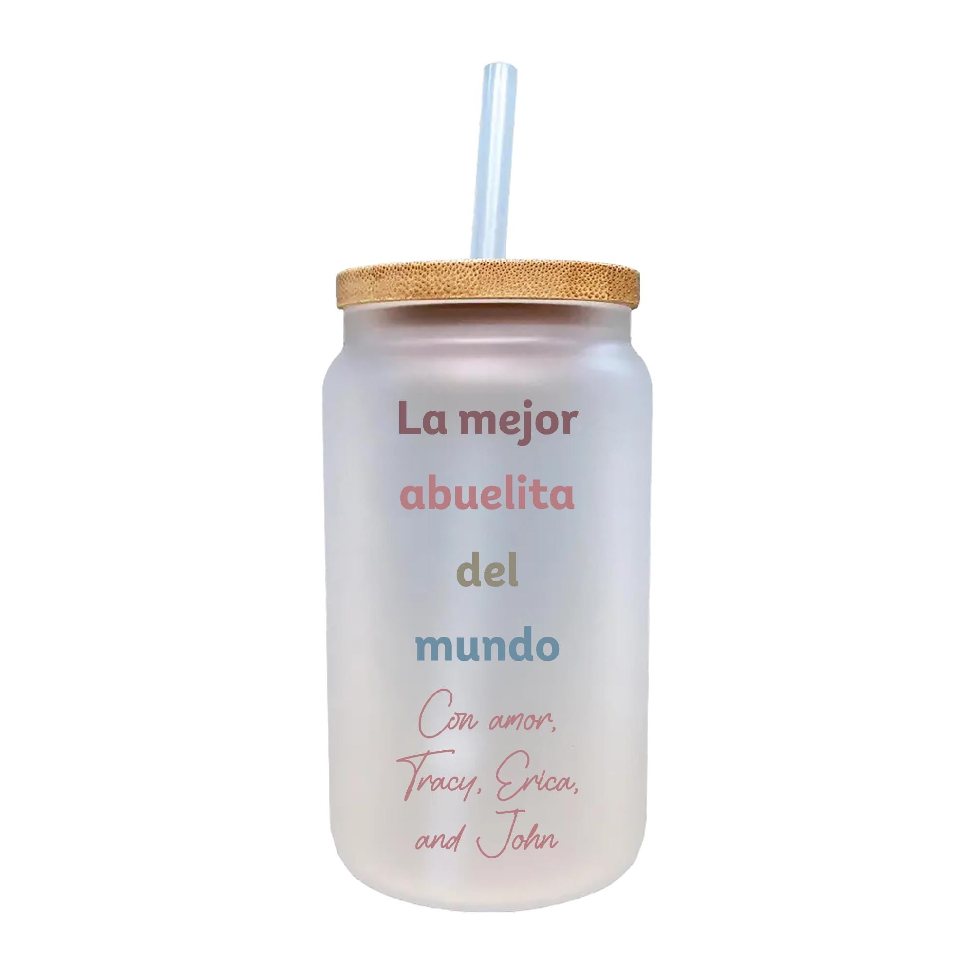 a glass jar with a straw in it