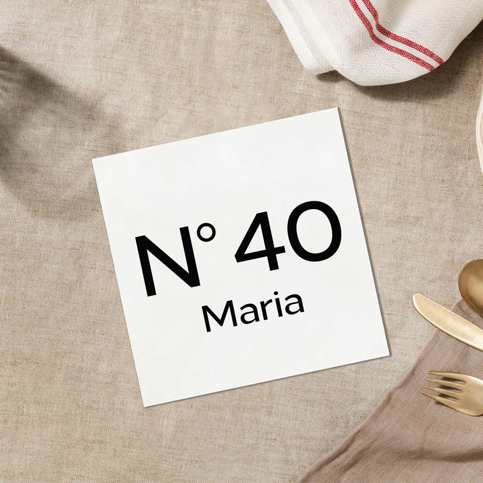 a table with a napkin, fork and knife