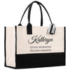 a white and black bag with a black handle