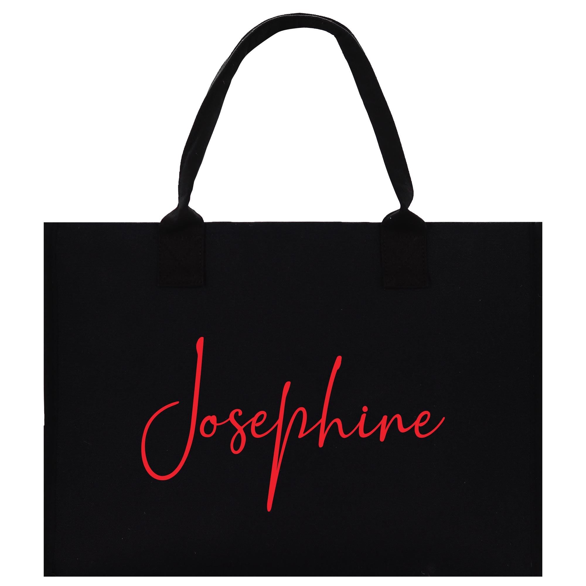 a black tote bag with a red name on it