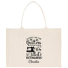 a tote bag with a sewing quote on it