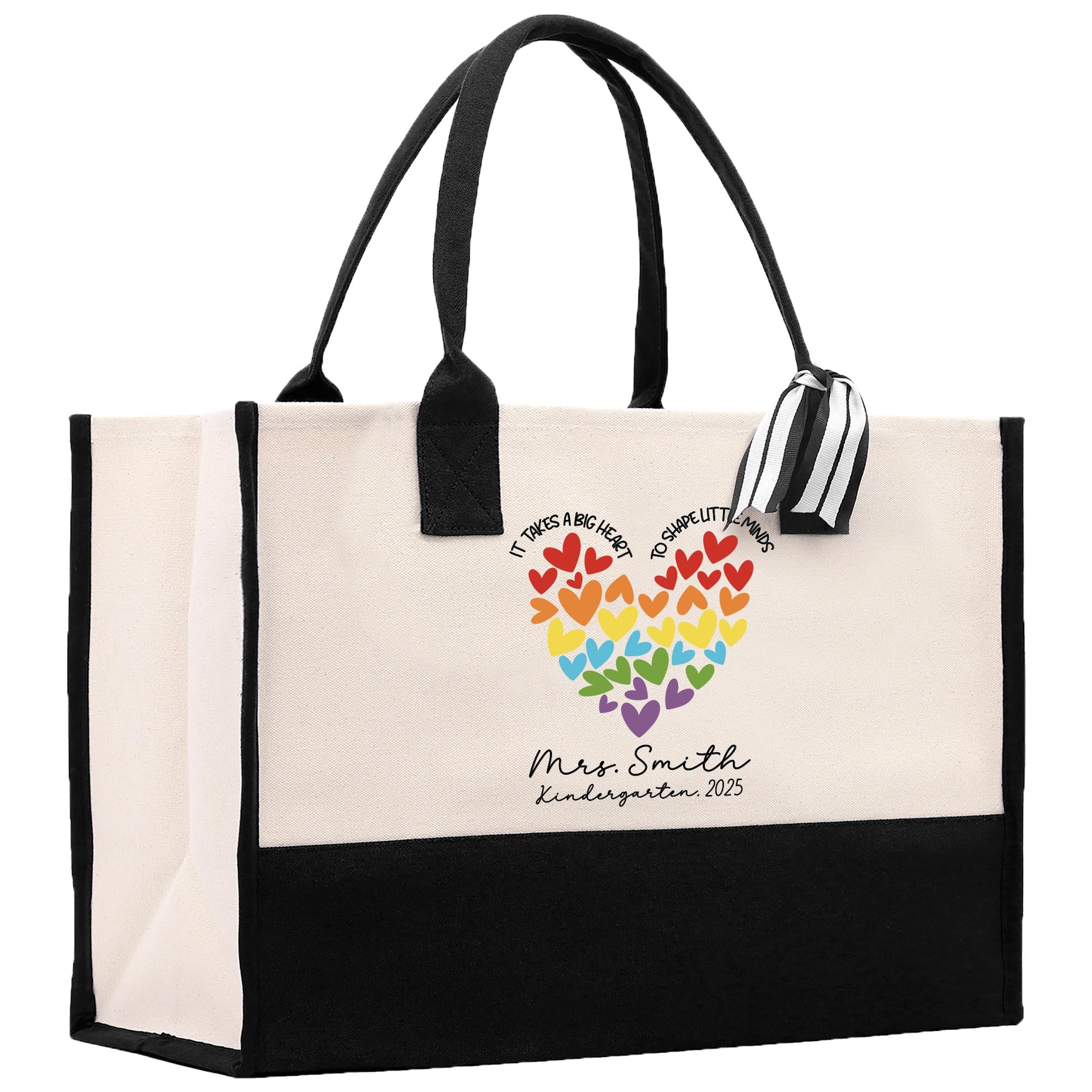 a white and black bag with a heart on it