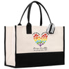 a white and black bag with a heart on it