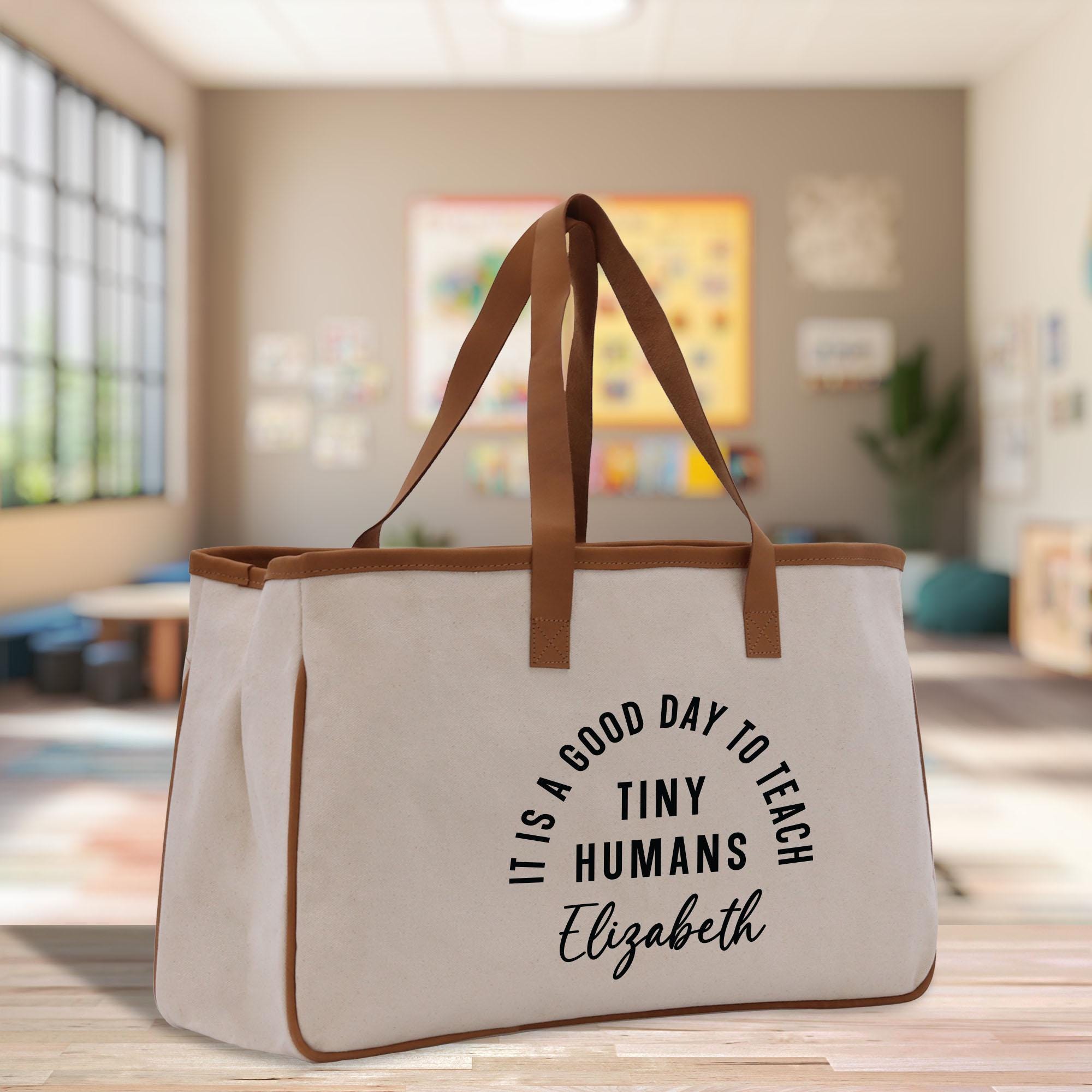 a canvas tote bag with a slogan on it