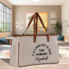 a canvas tote bag with a slogan on it