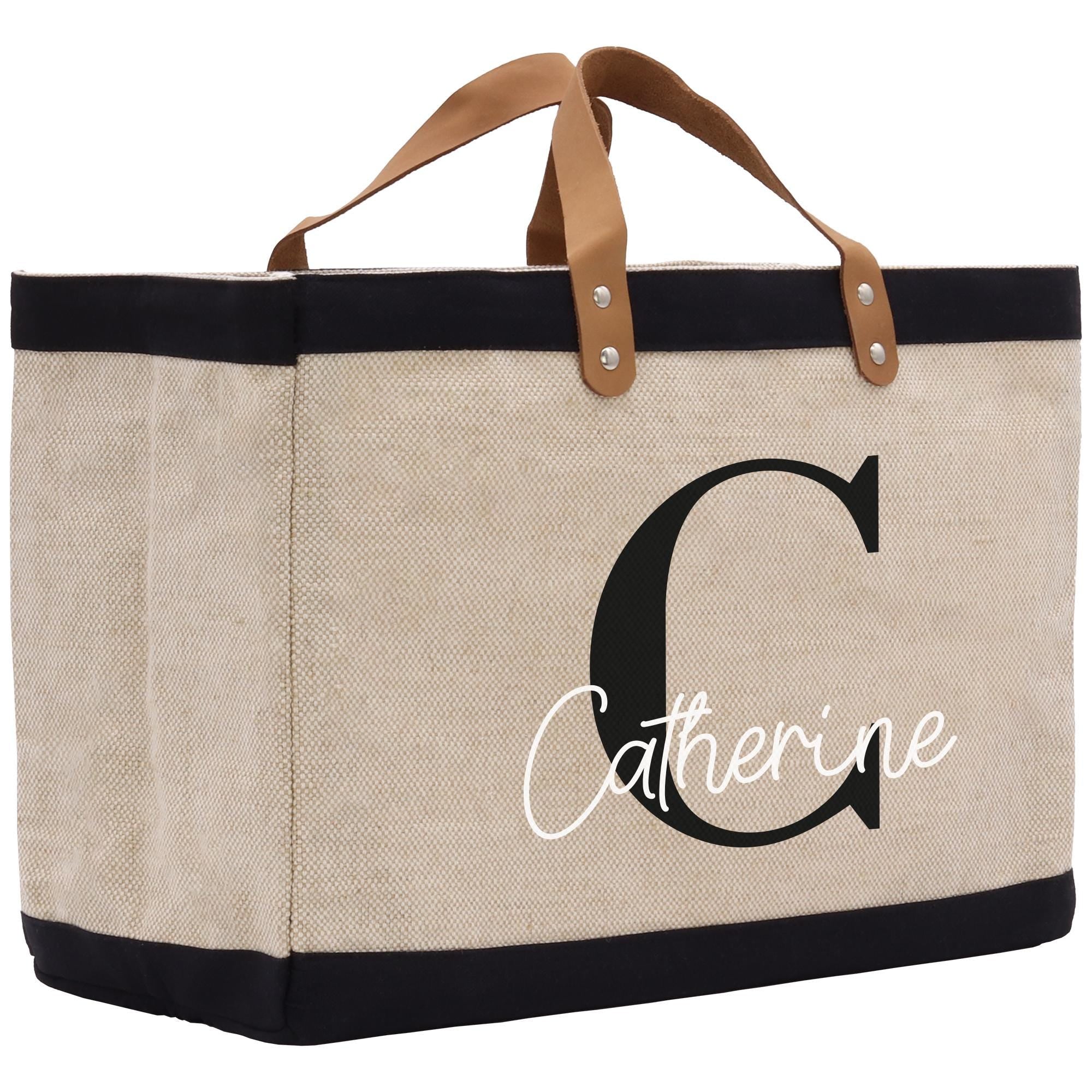 a canvas tote bag with the letter c on it