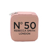 A pink makeup bag with the text 