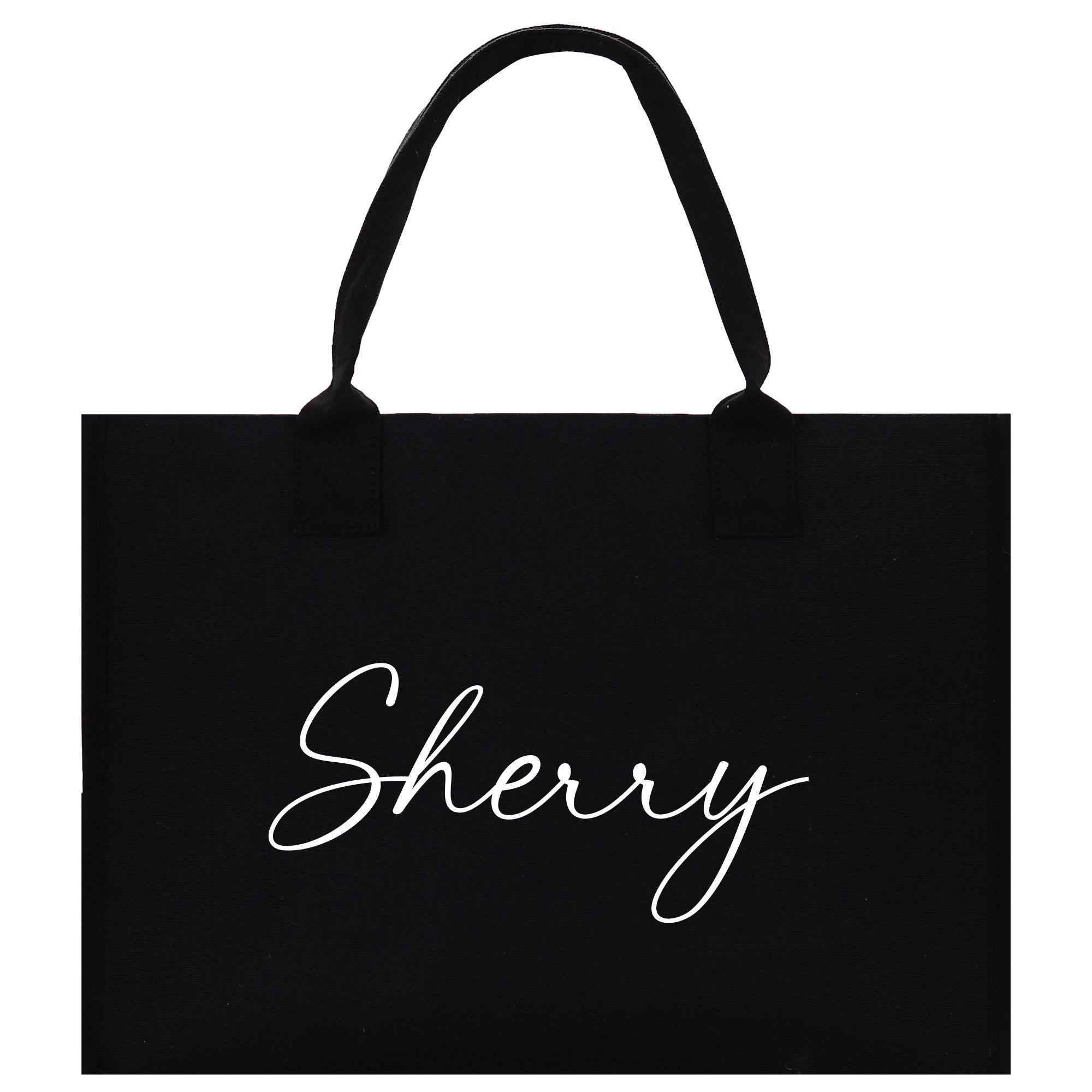 a black shopping bag with the word sheryl printed on it