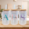 three personalized water bottles sitting on a table