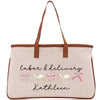 a white bag with pink bows on it