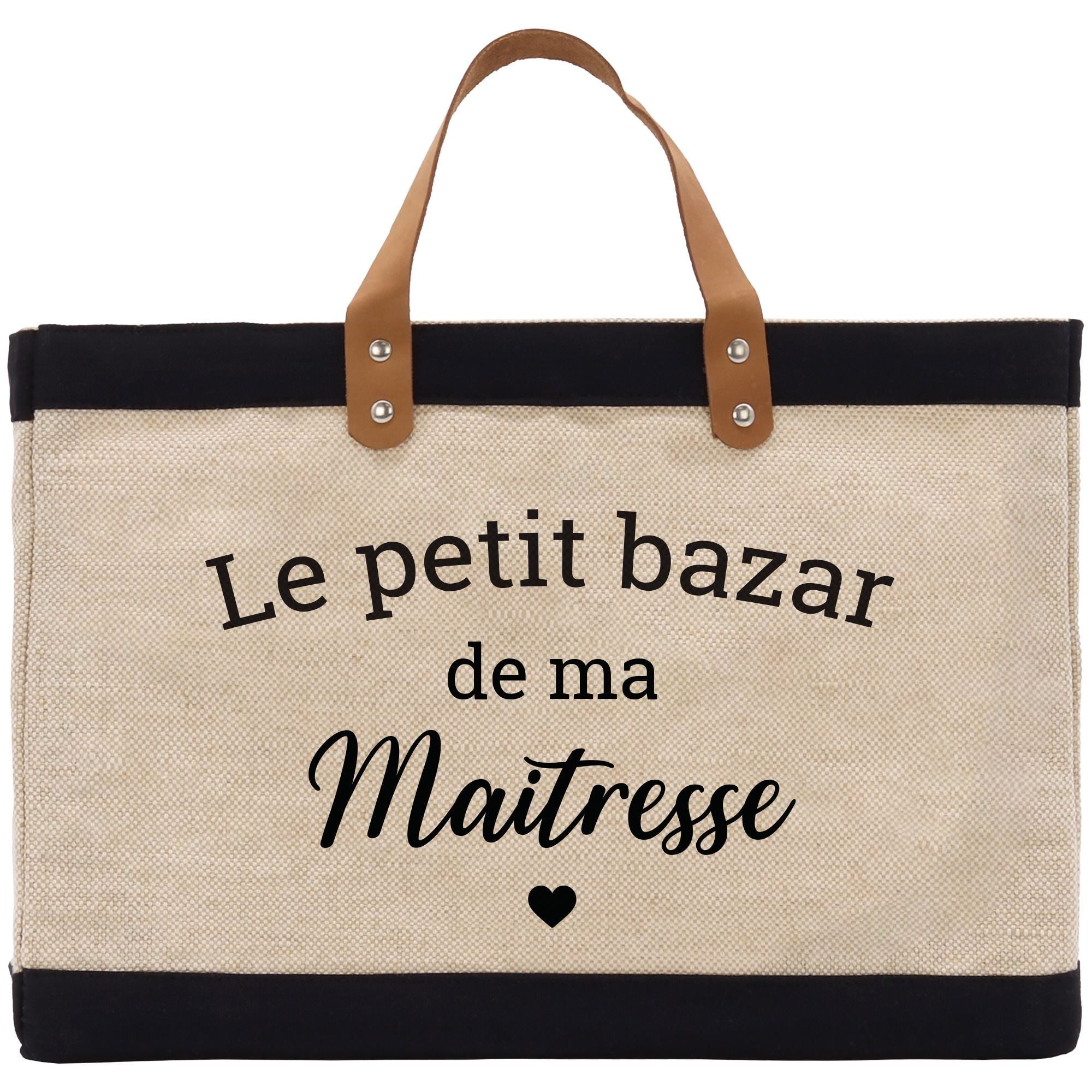 a black and white bag with the words le petit bazar de ma mat
