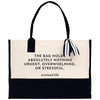 a black and white bag with a quote on it