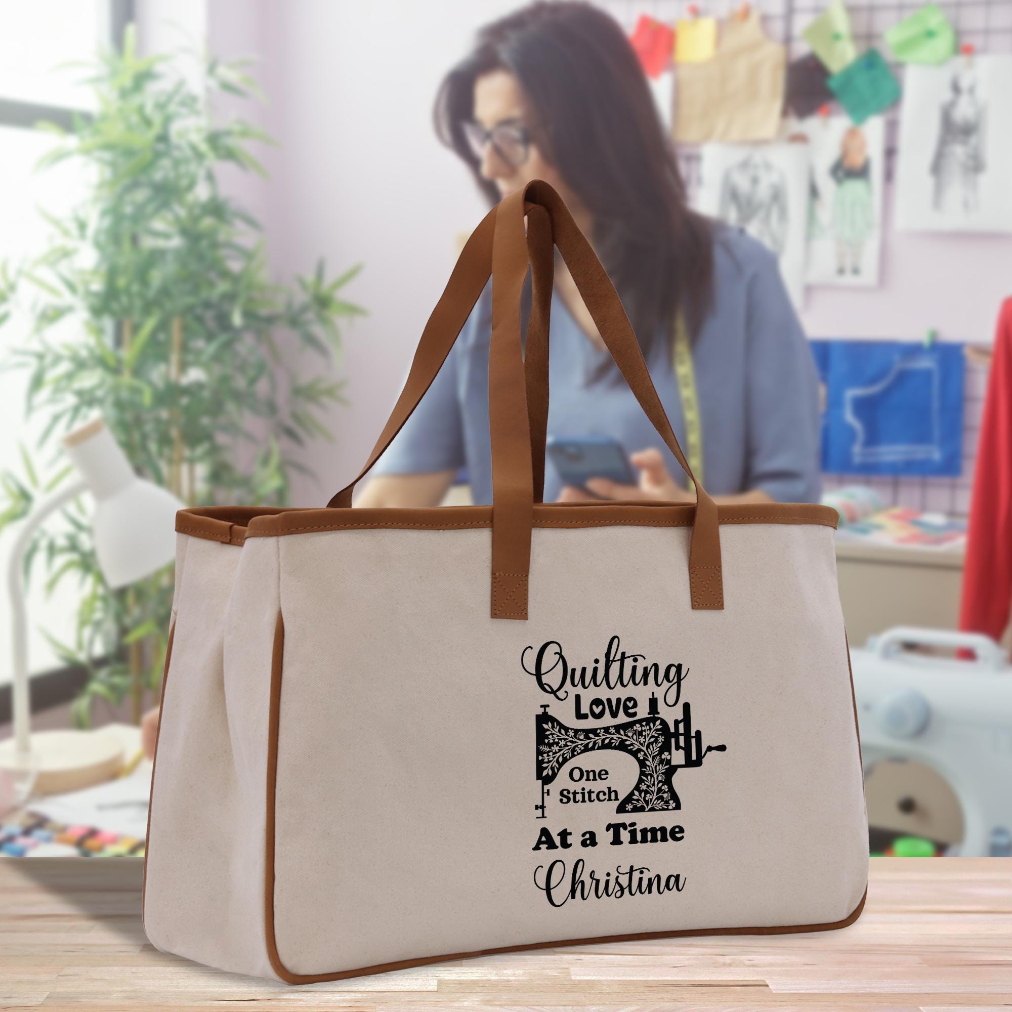 a woman sitting at a table with a sewing bag