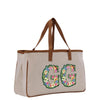 a white bag with a floral design on it