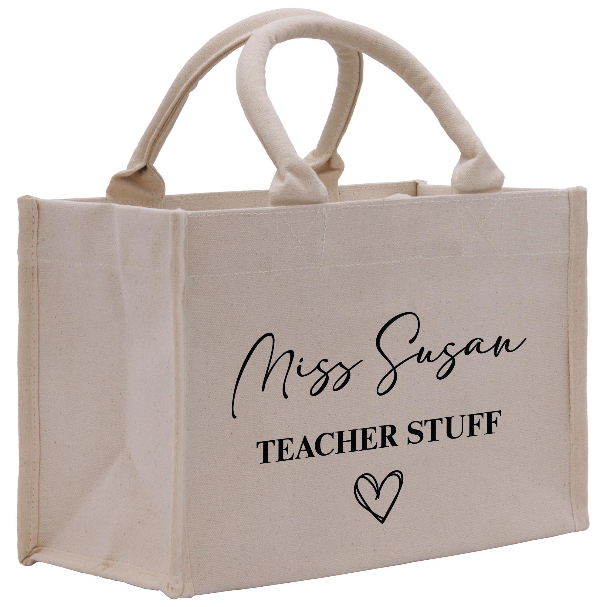 a white bag with the words miss susan teacher stuff on it