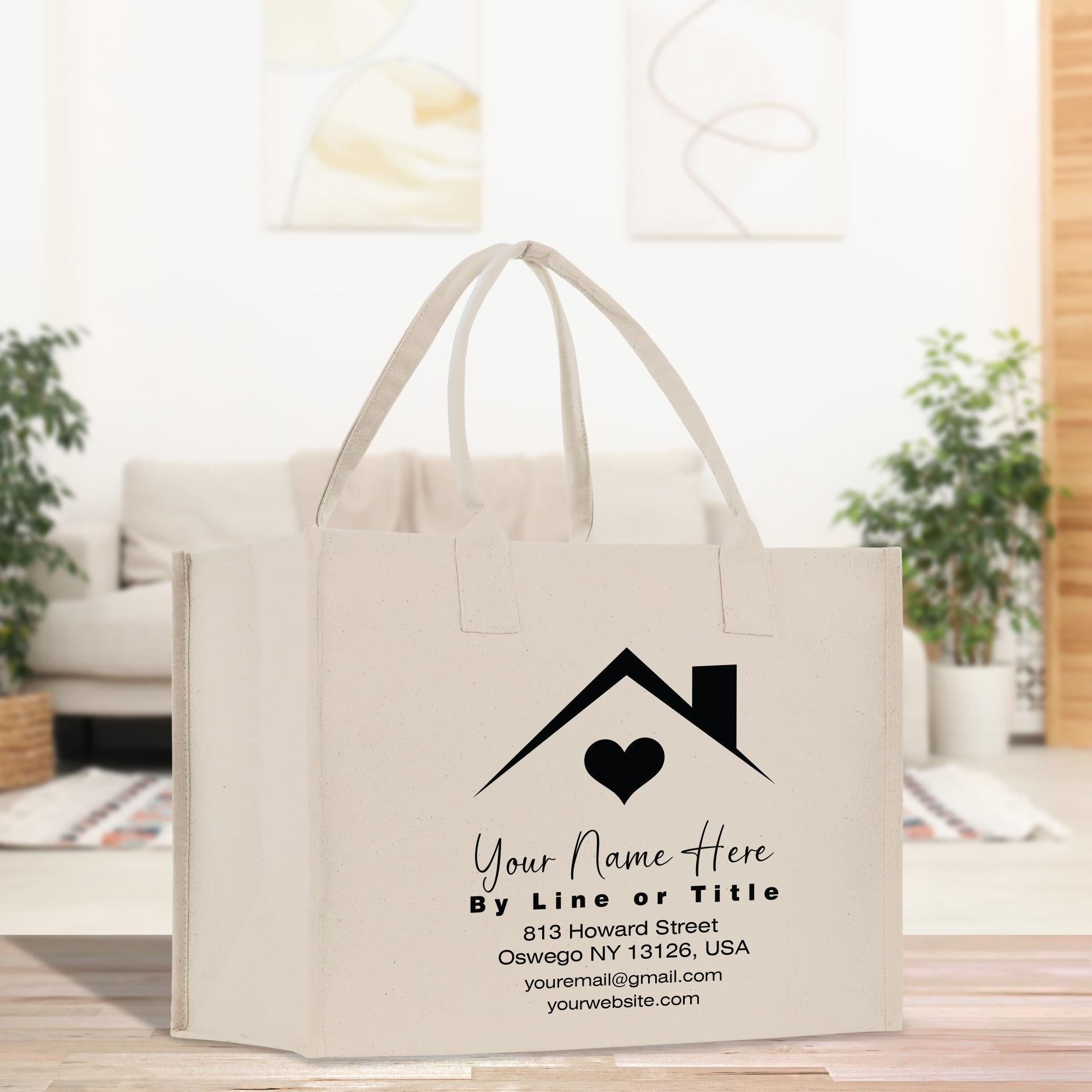 a white bag with a house and heart on it