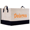A beige and black tote bag with the word "Dolores" printed in orange on it.