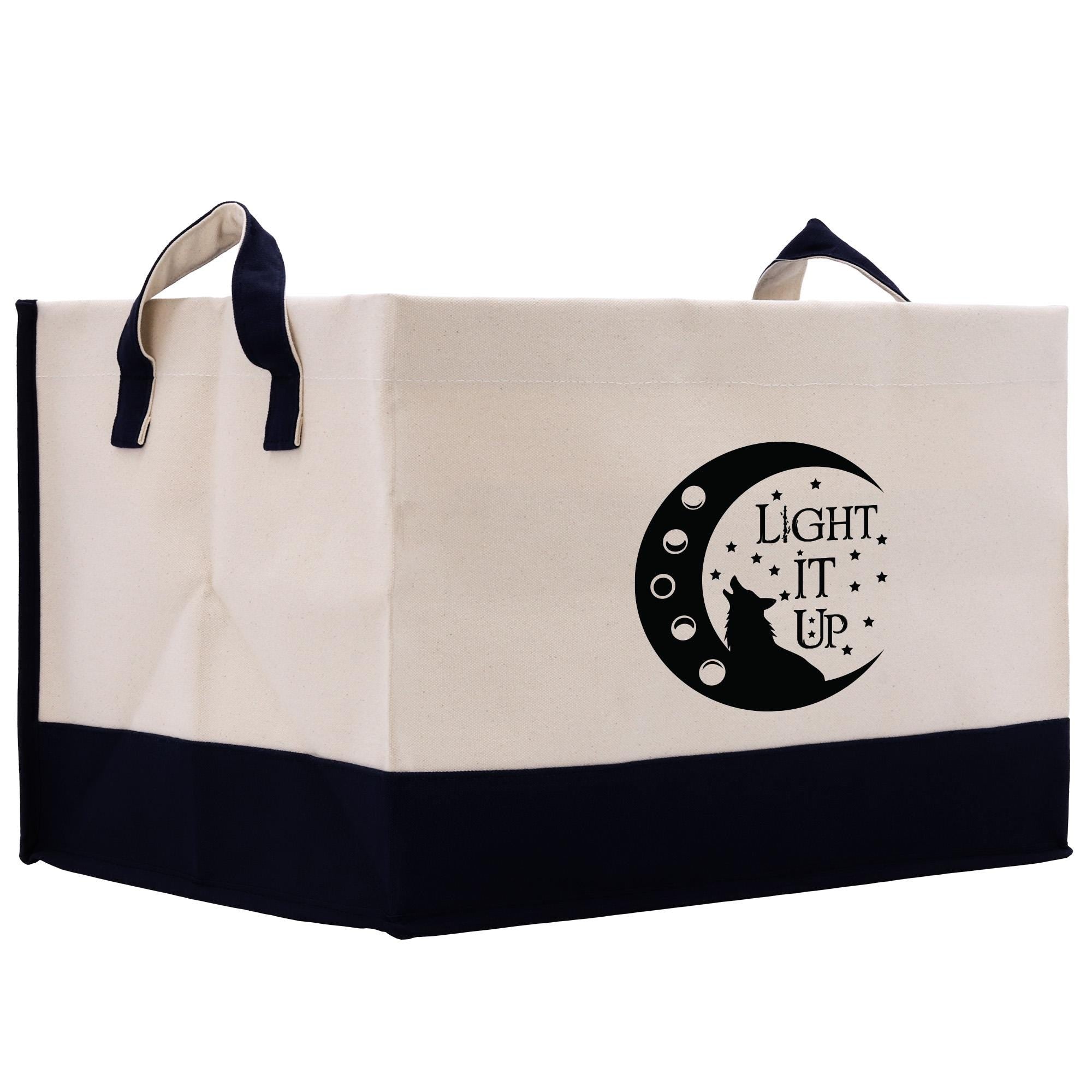 a black and white bag with a cat on it