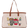 a canvas bag with a picture of an apple, pencils, and a jar