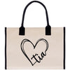 a canvas bag with a heart and initials on it