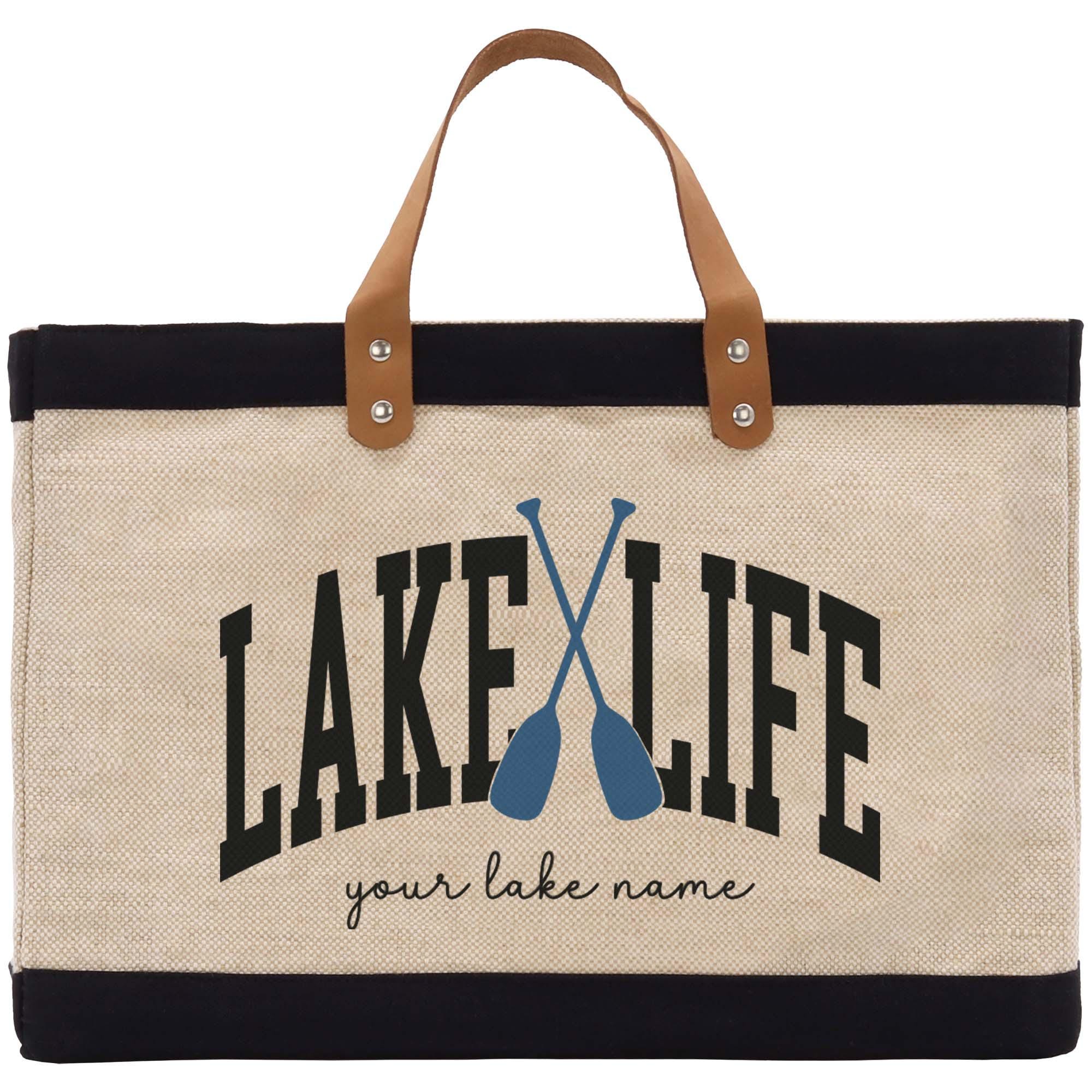 a canvas bag with a pair of paddles on it