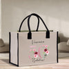 a white bag with pink flowers on it