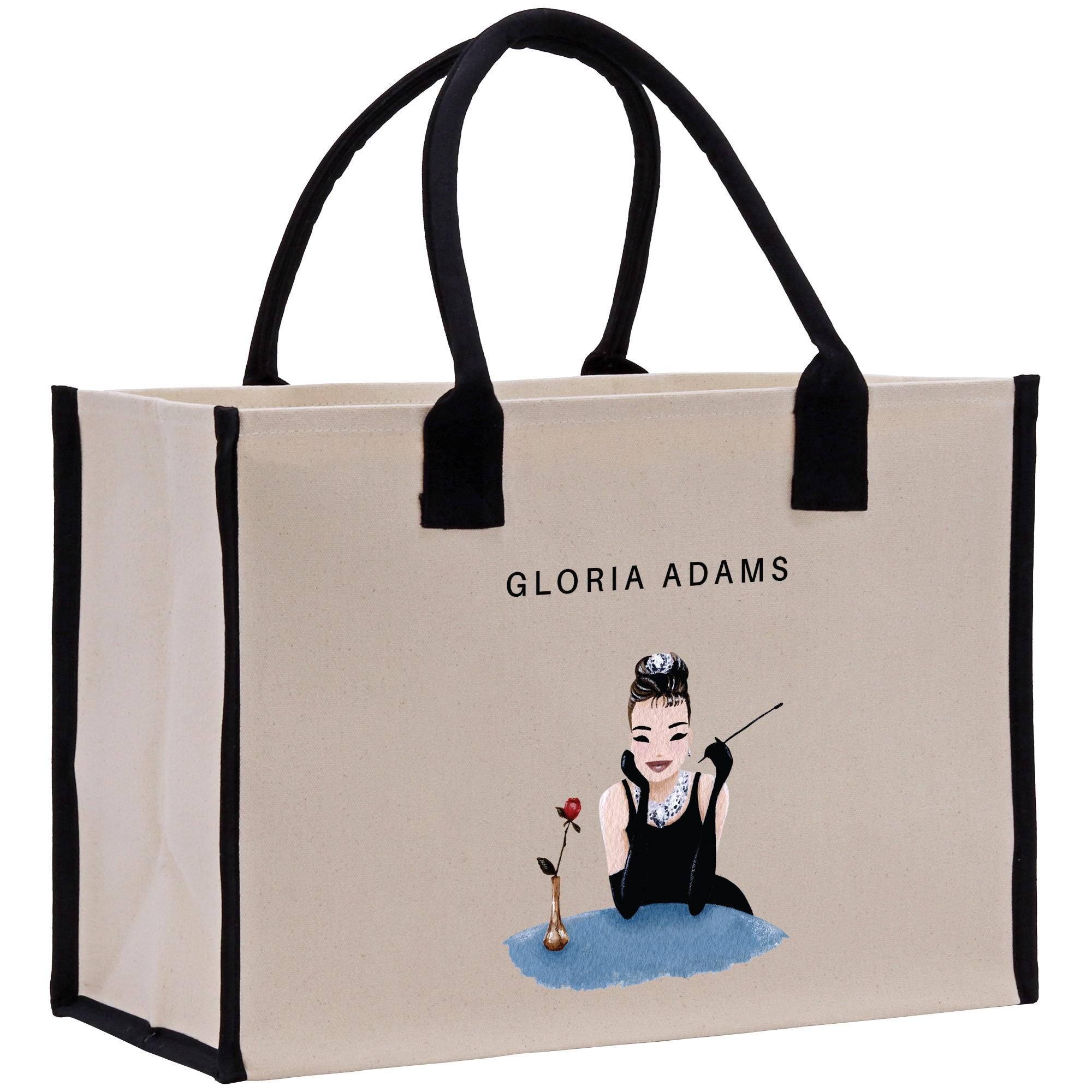 a shopping bag with a picture of a woman holding a rose