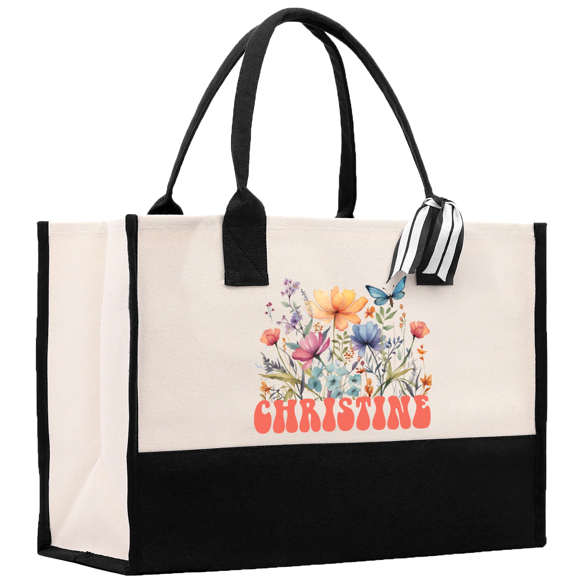 a black and white shopping bag with flowers on it