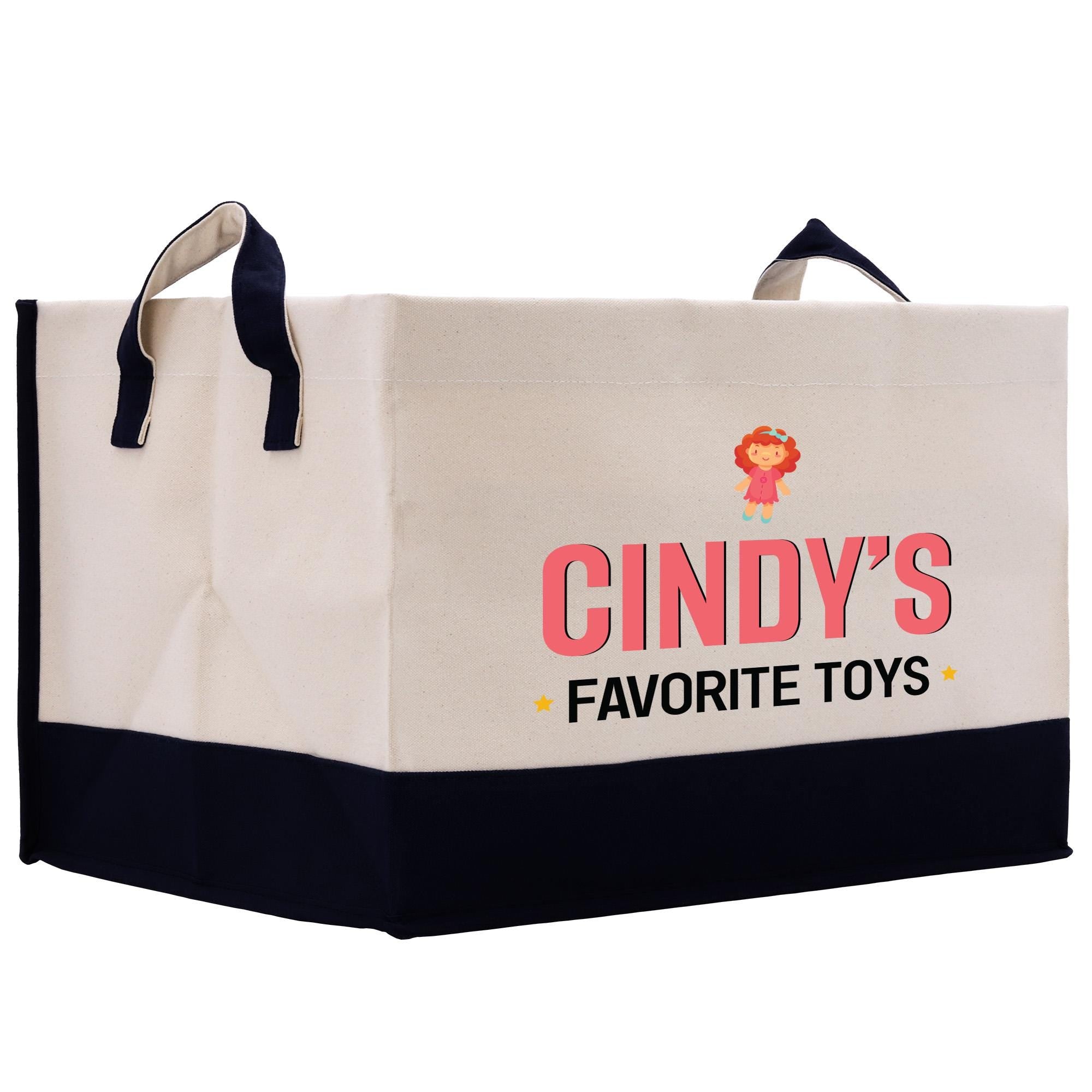a white and black shopping bag with the words candy&#39;s favorite toys on it