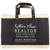 A black and beige tote bag with white text printed on it.