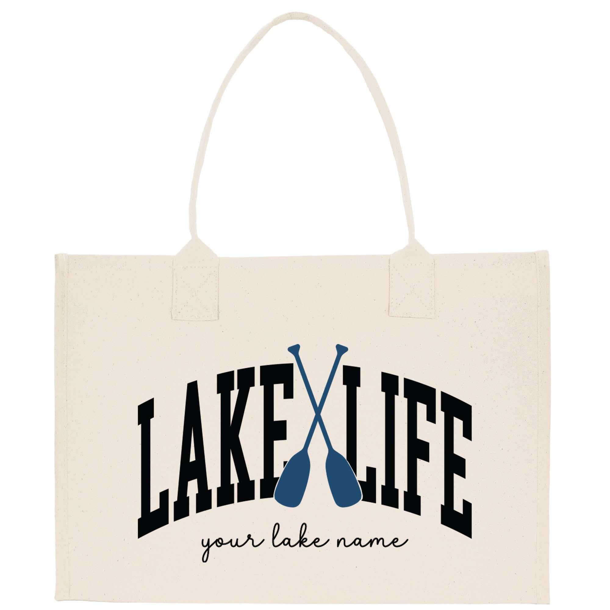 a lake life bag with a pair of paddles on it