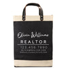 A black and beige tote bag with the text 