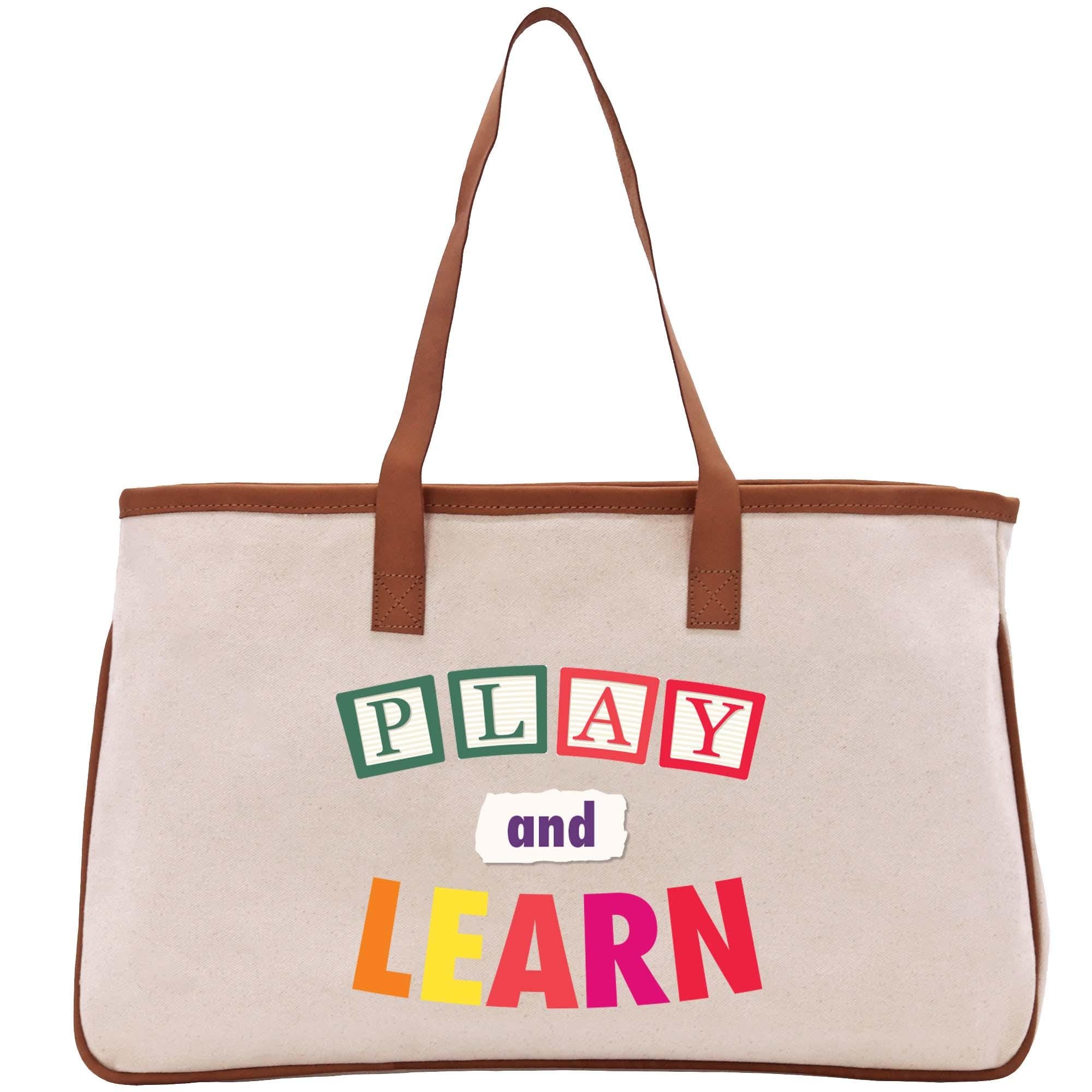 a canvas bag with the words play and learn on it