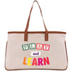 a canvas bag with the words play and learn on it