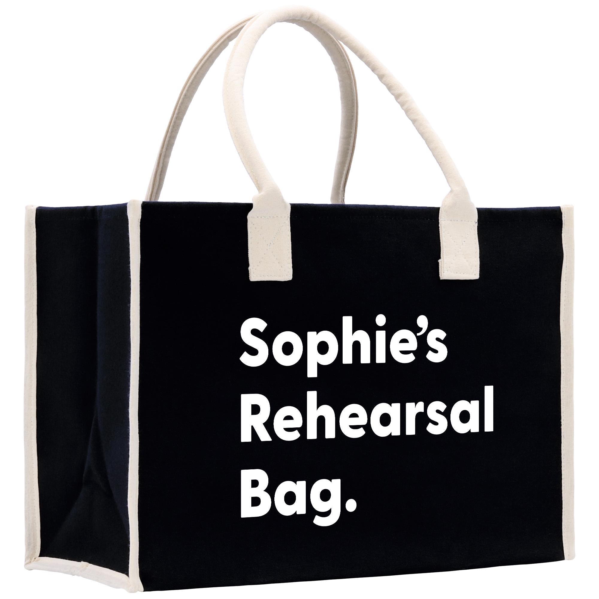 a black and white shopping bag with white handles